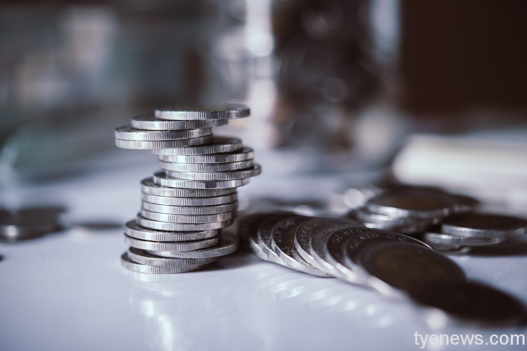 bottles cash with coins saving money concept