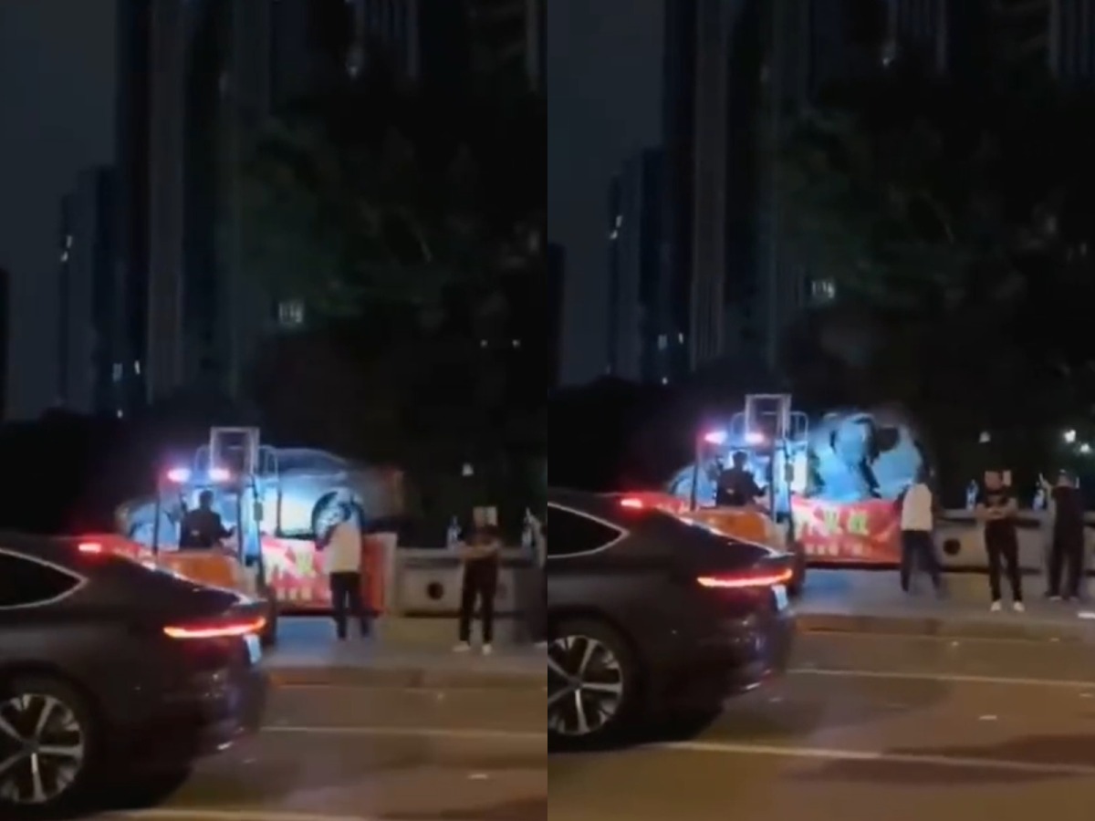 不滿社區車位被霸占 男怒出動堆高機扔水裡 FotoJet 9