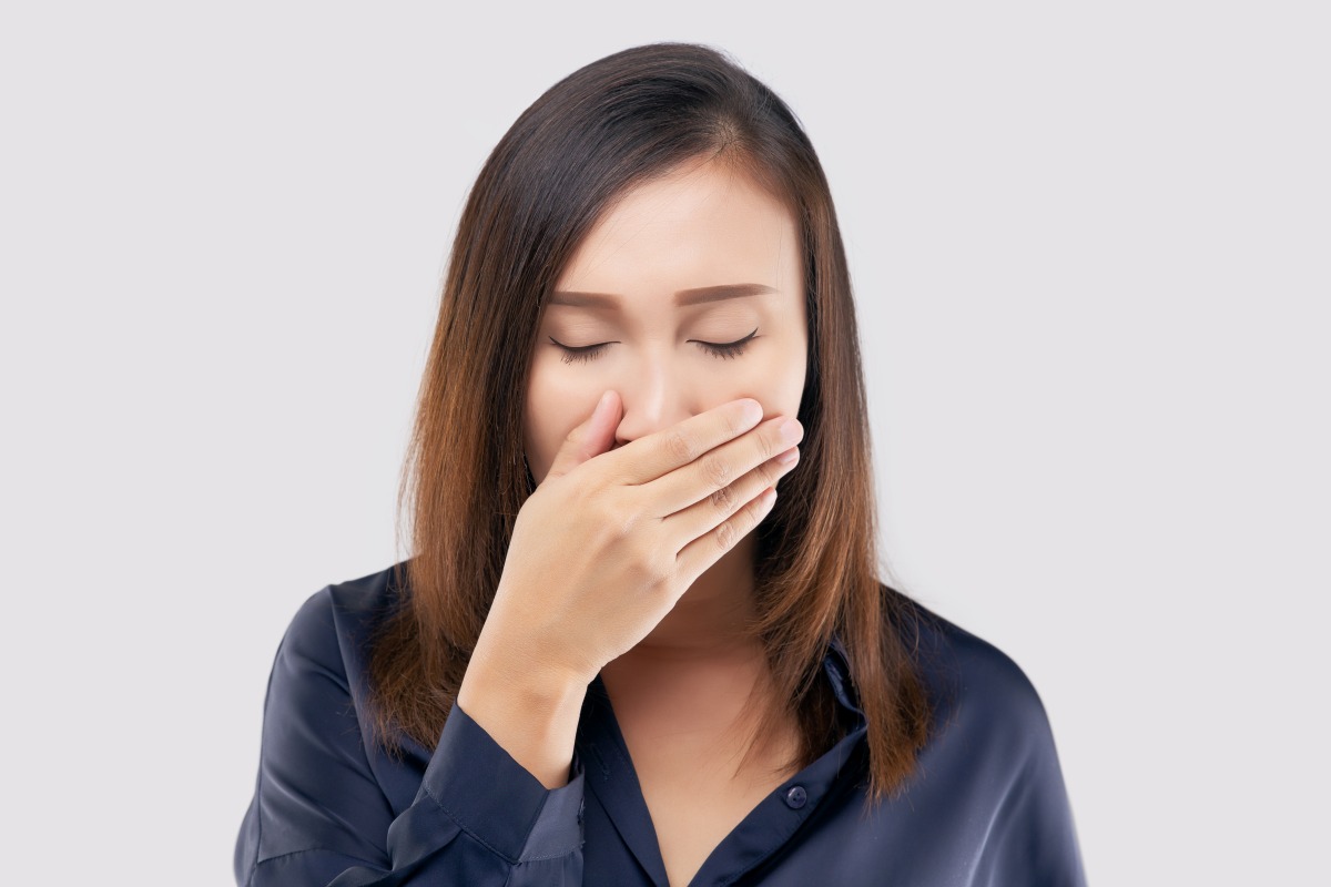 portrait tired girl who yawns woman yawning light gray background