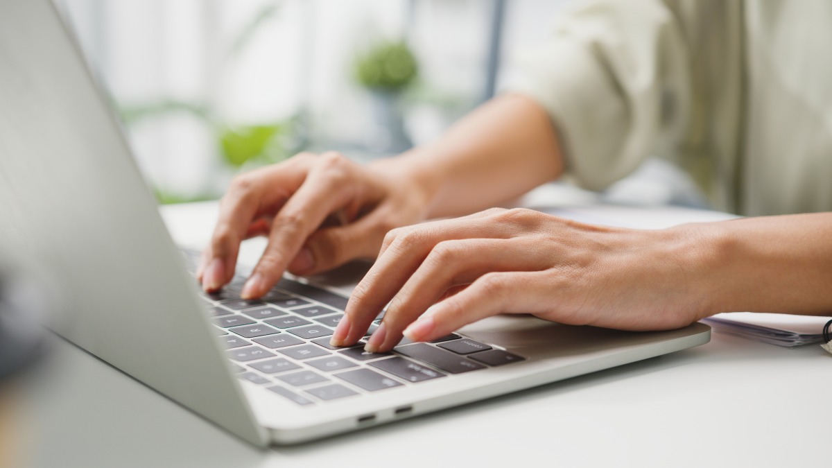 freelance young businesswoman casual wear using laptop working living room home