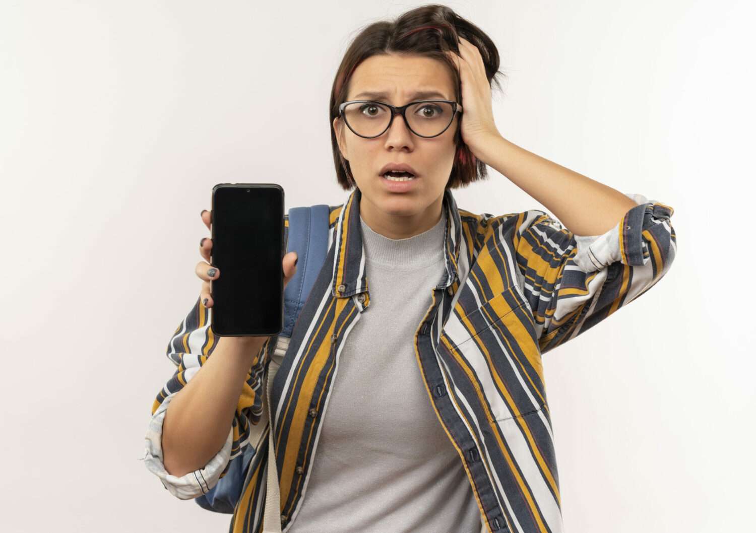 網購3C產品收750元審查費惹議 NCC這樣說 anxious young student girl wearing glasses back bag showing mobile phone putting hand head isolated white 1 scaled e1708487021471