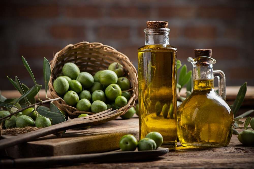 olives olive oil bottles close up