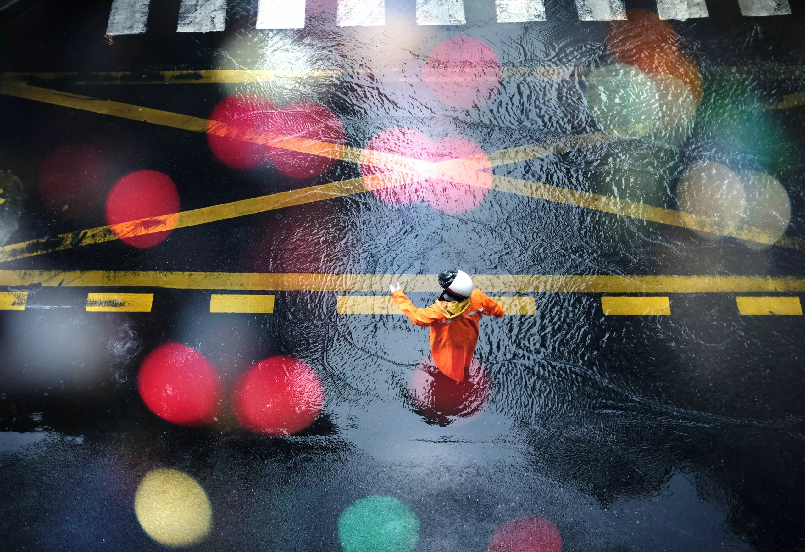 traffic police standing rain scaled