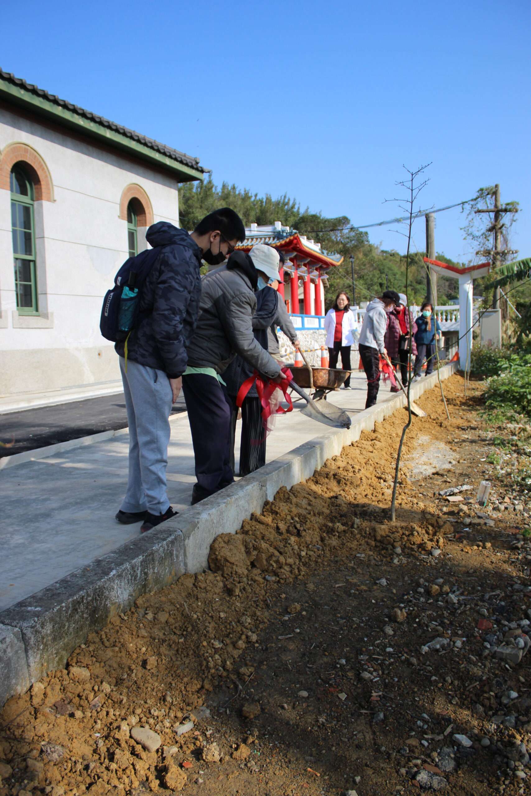 樂生園區茂盛的大樹曾是因病受隔絕的院民身心寄託。目前園區工程接近完工，種樹活動 0 scaled